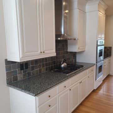 Kitchen cabinets painted white in SW Portland