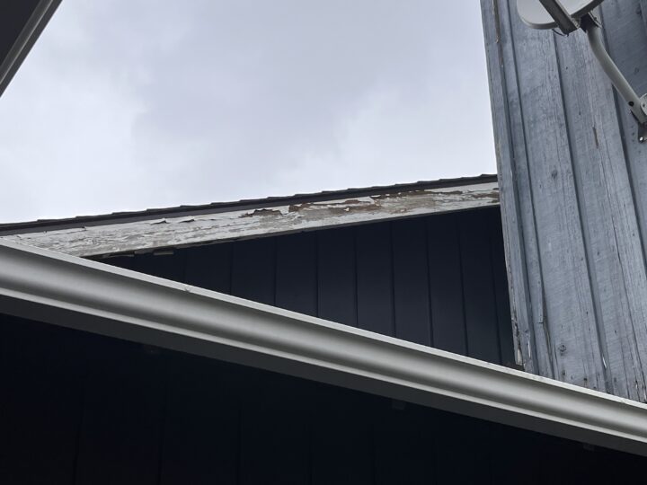 Before photo of exterior trim in need of repair and paint on a house in Portland