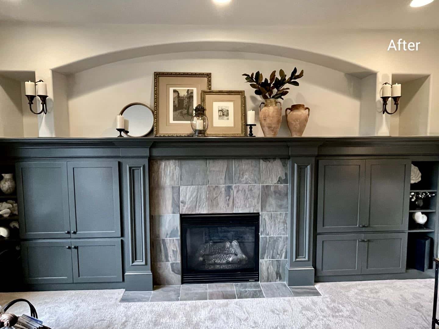 Photo of Sherwood family room gets fresh painted fireplace surround with built-in cabinets to warm it up. in Portland, Oregon