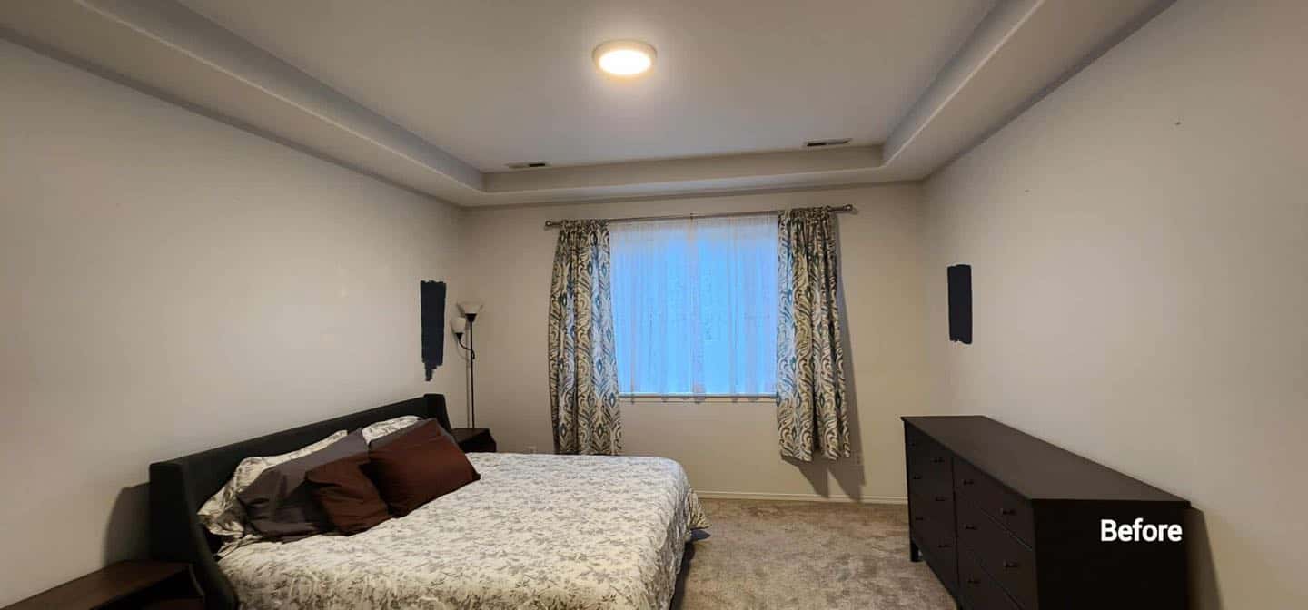 A Sherwood-themed bedroom with a bed and a dresser.