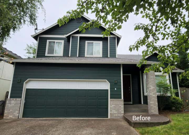 A 5-star Google review-worthy exterior home in Tigard, featuring green siding and a garage.