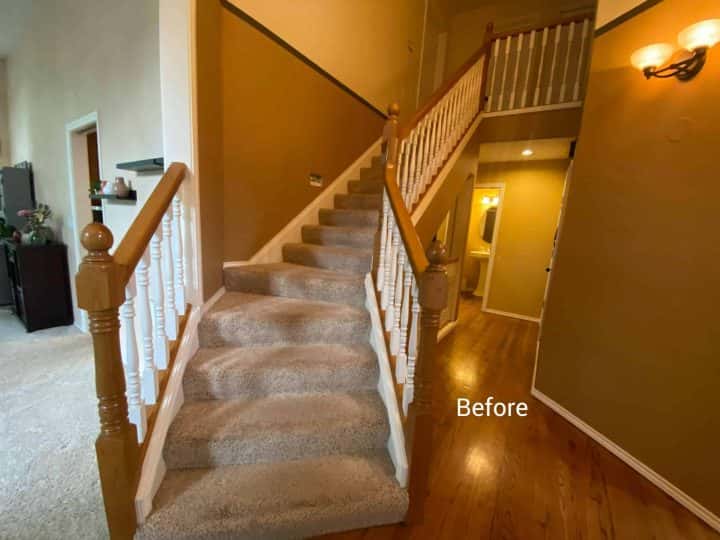 A Beaverton home's interior staircase transformed after a painting project.