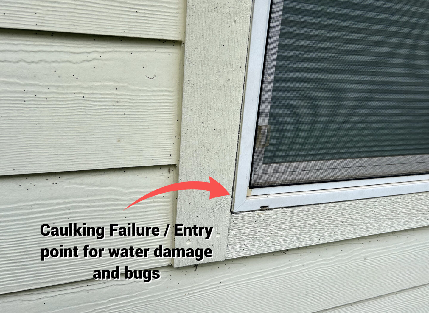 Close-up of a window on an exterior wall with a gap in the caulking, illustrating an entry point for water damage and bugs, often exacerbated by paint failures.