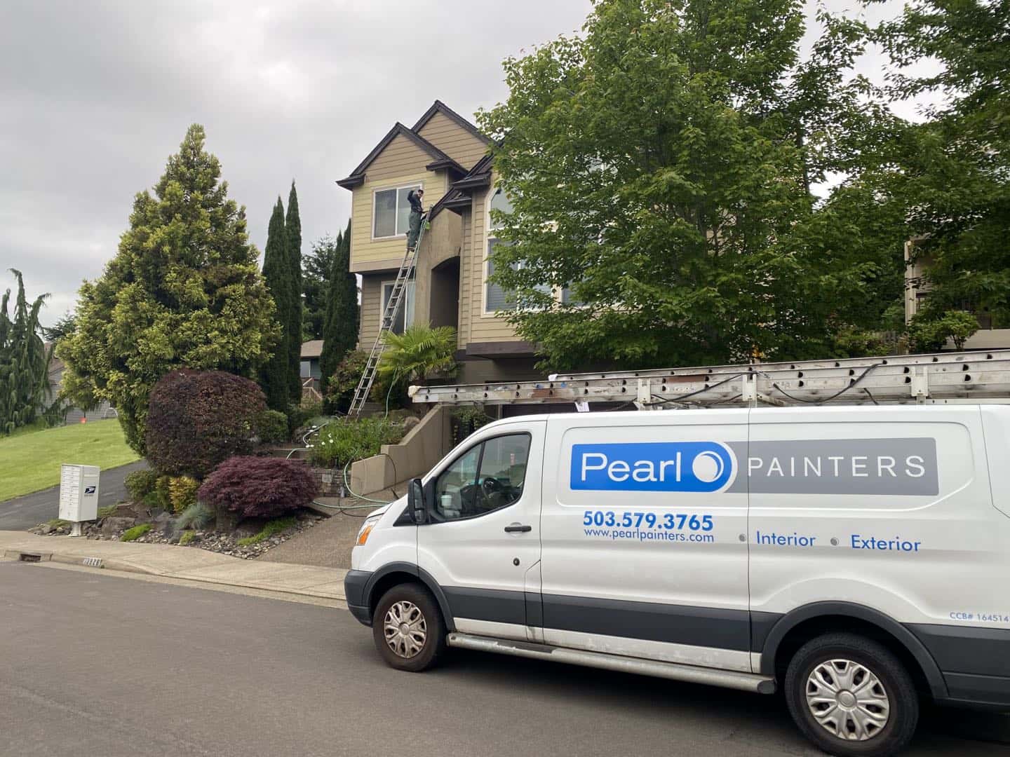 Photo of Our Pearl Painters team brightens up this Tigard homes exterior with a fresh coat of paint. in Portland, Oregon