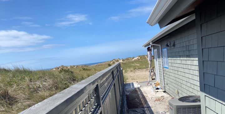 Manzanita Beach House with a stunning ocean view and sand dunes exterior, available in 2022.