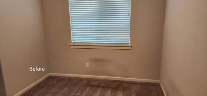 A small Tualatin home interior with a window and blinds.