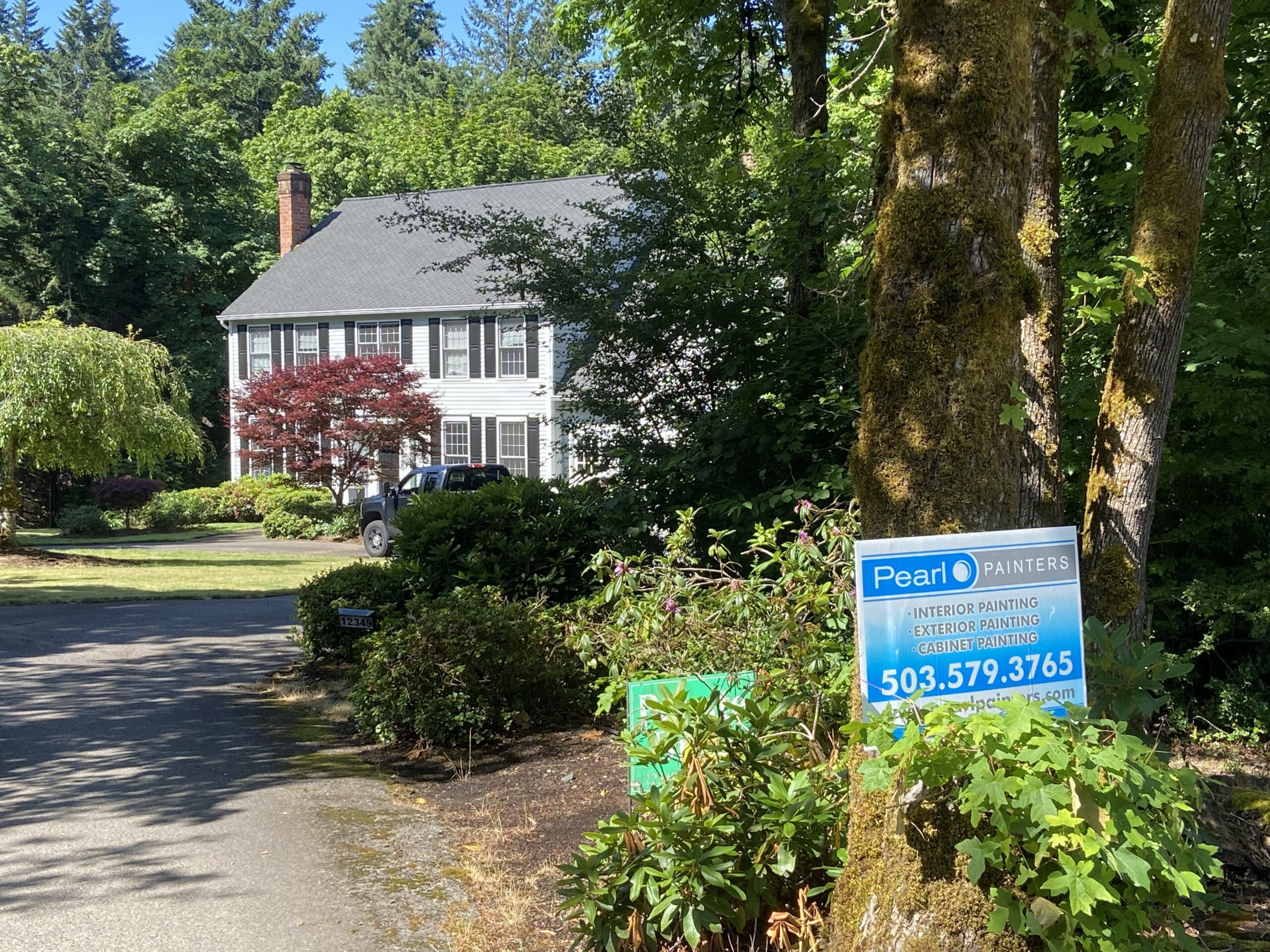 Pearl Painters sign in yard of Lake Oswego home