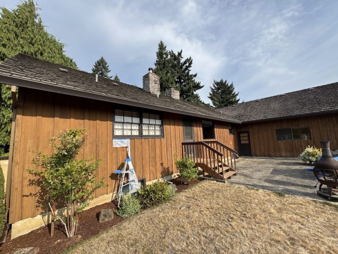 Craytor wooden house with shingled roof, porch, dry lawn; painting by Pearl Painters, Portland, August 2025 sky.