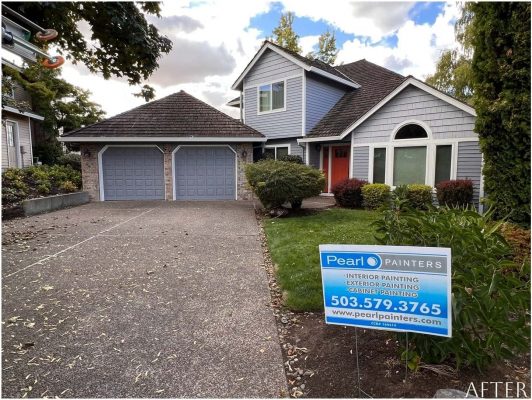 A home in Beaverton with a sign in front of it.