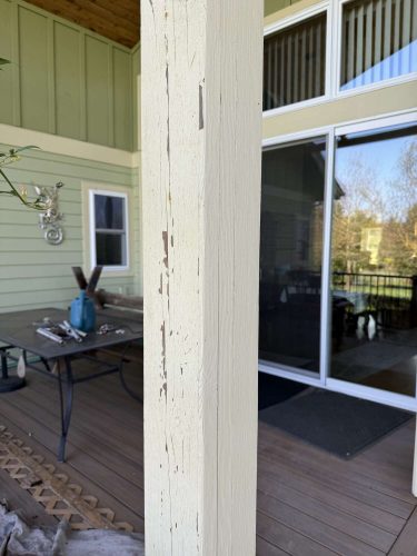A painting by McCaffery, taken in April 2025, shows a close-up of an exterior porch post in Portland with peeling paint, outdoor furniture, and glass doors reflecting trees and sky. Associated with Pearl Painters.