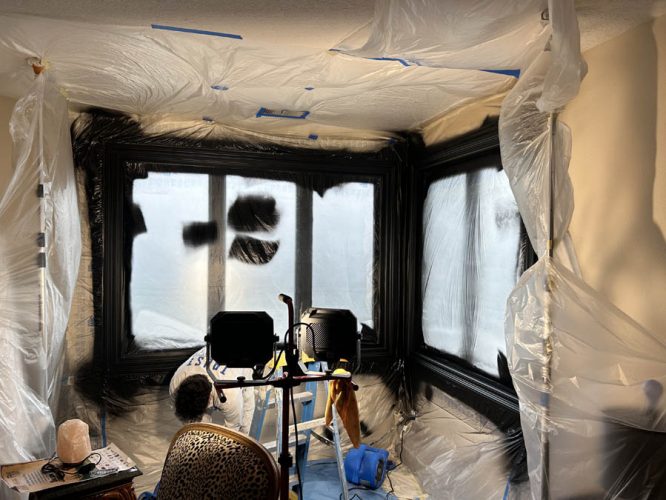 Plastic covers windows during painting project in West Linn
