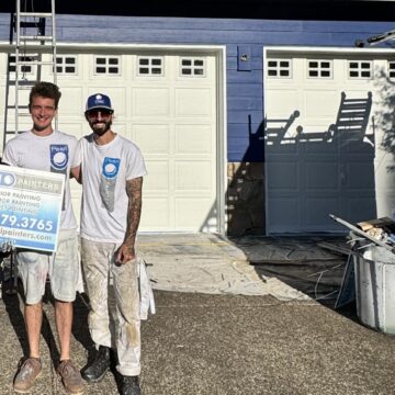 Three painters with Pearl Painters sign stand by blue Jennings house, Portland, with painting gear and truck; jobs start July 2025.