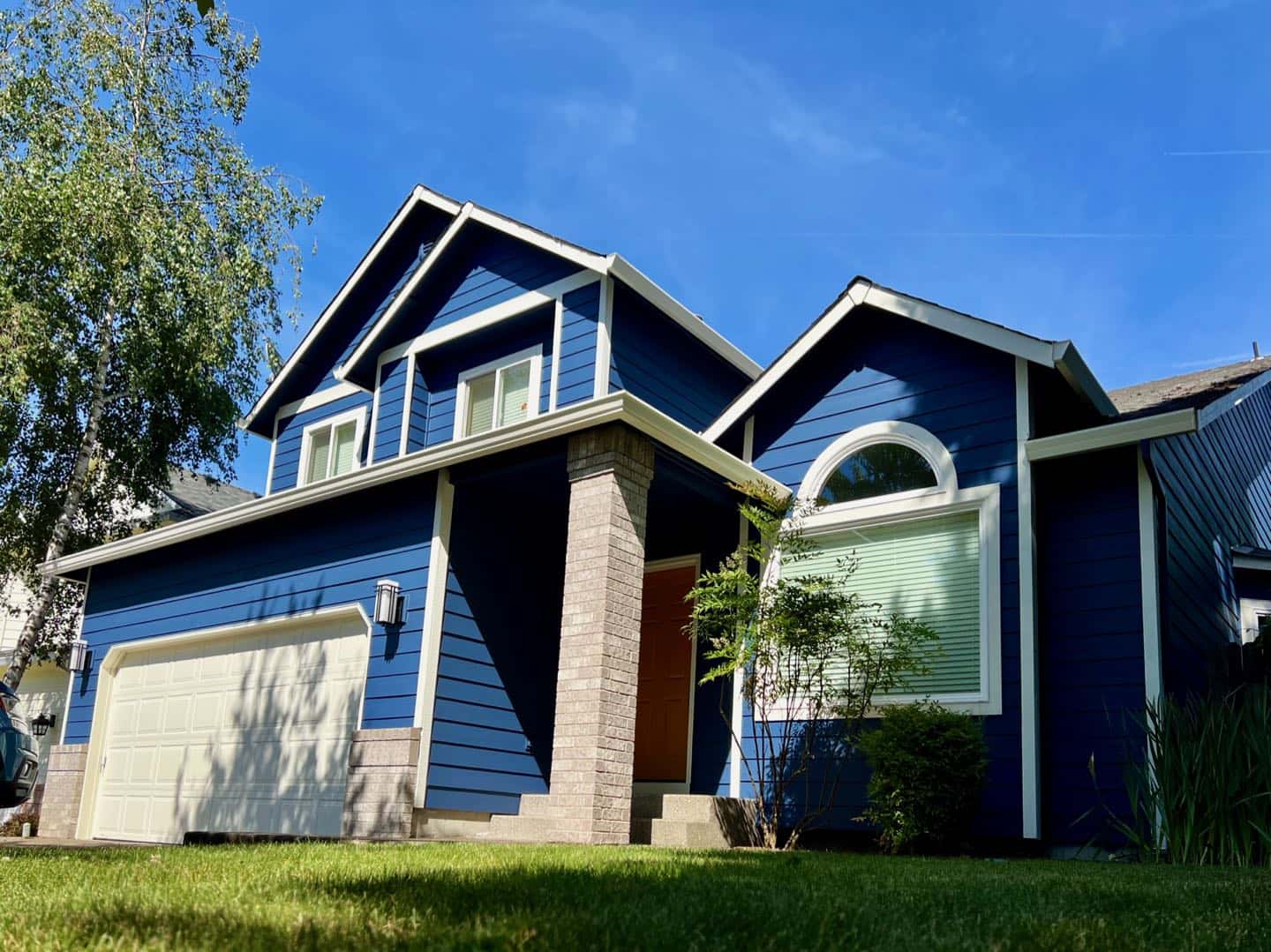 Looking for professional house painters? Look no further! We specialize in exterior house painting, bringing new life to homes with our meticulous attention to detail. Our experienced team can transform any house with blue siding into