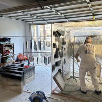 Pearl Painters professionally spraying cabinet doors