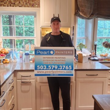 Satisfied customer after Pearl Painters painted kitchen cabinets