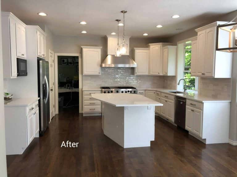 A Portland kitchen with white cabinets and hardwood floors.