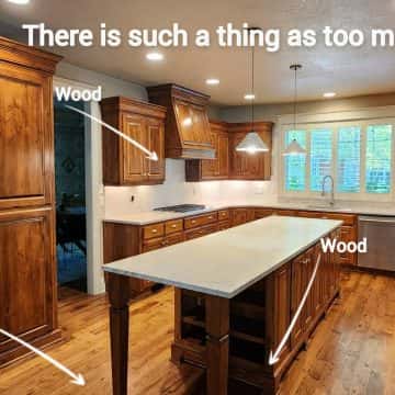 Photo with words "there is such a thing as too much wood" with arrows pointing at all the wood in a Lake Oswego kitchen