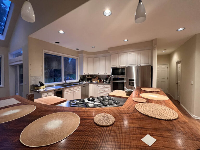 A kitchen in a Wilsonville home with a large island and counter tops.